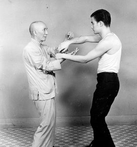 Bruce lee and Yip Man in chi sau